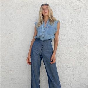 Reworked vintage Levi top. Hand sewn tee on back